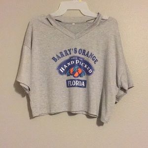 Gray Graphic Tee with Slits around the shoulder